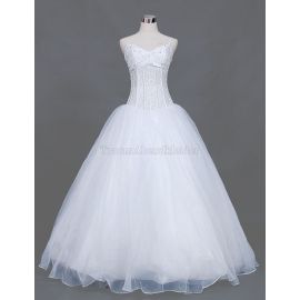 Vestido de novia romántico de organza con cenefa con apliques