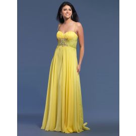 Glamorosos vestidos de fiesta largos amarillos con cola.