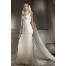 Atractivo vestido de novia romántico con pedrería y velo